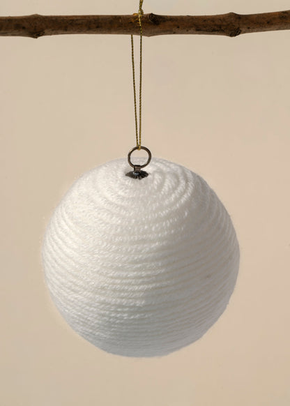 Esfera de estambre hueso, detalle del enrollado
